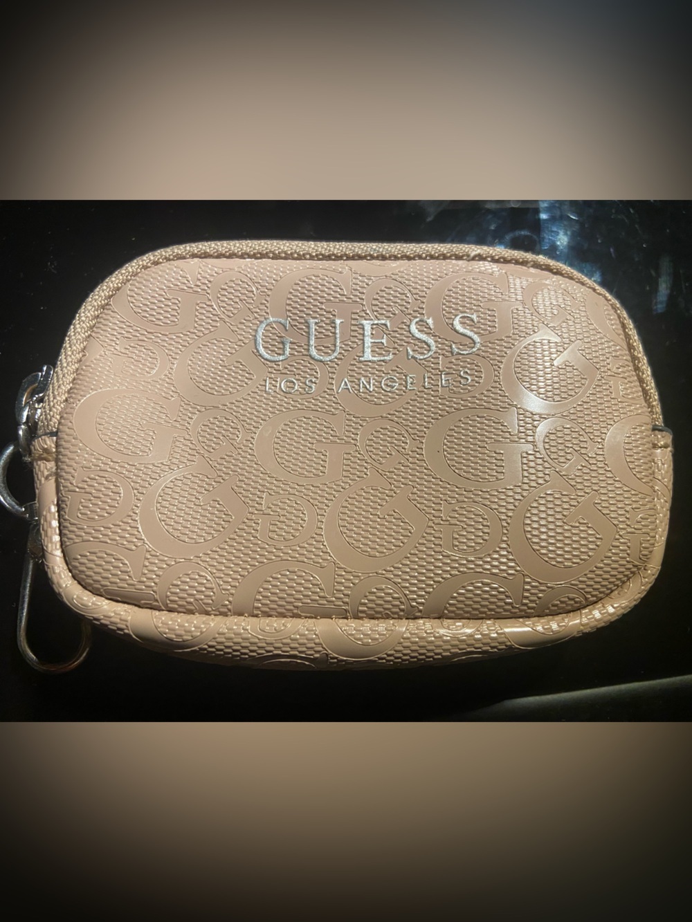 Guess Logo-Embossed Crossbody Pouch in Beige